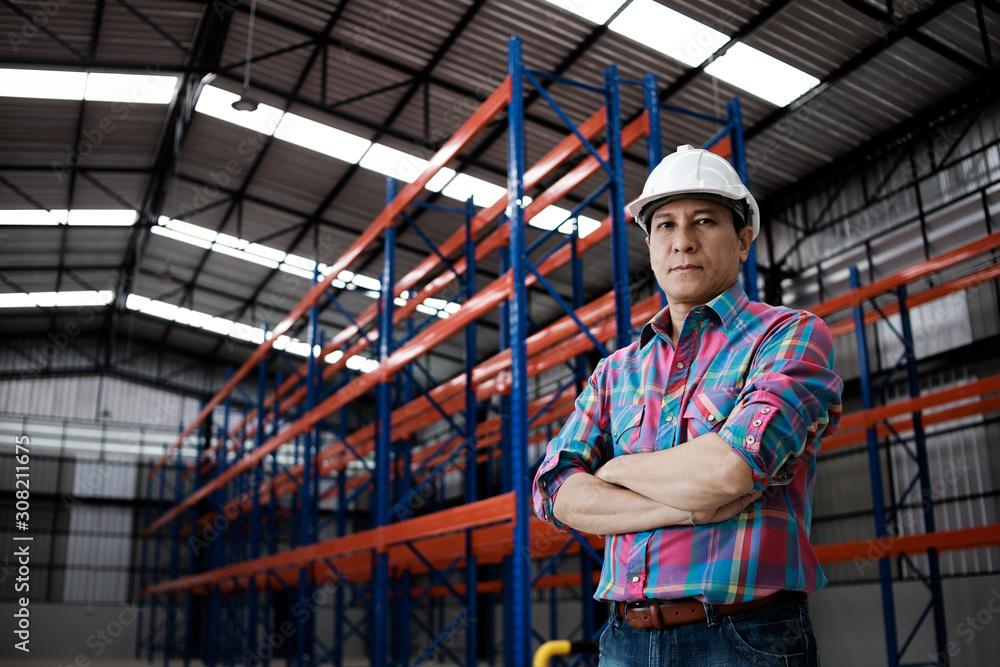 Asian Engineer man working in building factory Asian Engineer man working in building factory