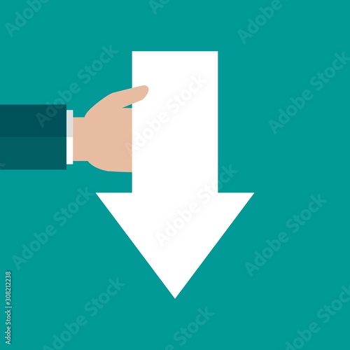 businessman hand holds arrow down isolated on turquoise background.
