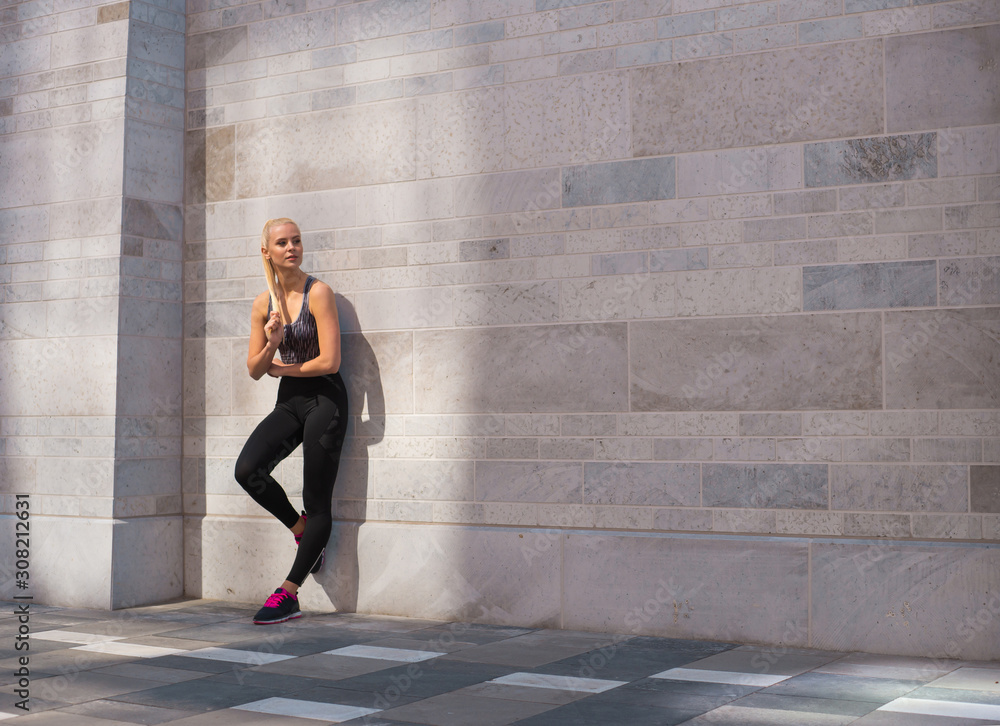 Attractive woman in sportswear training outdoor. Sport, jogging, healthy and active lifestyle. Attractive woman in sportswear training outdoor. Sport, jogging, healthy and active lifestyle.