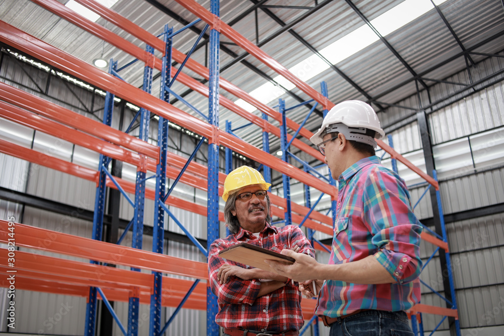 Asian Engineer man working in building factory Asian Engineer man working in building factory