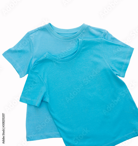 Blue T-shirts isolated on white background/ Top view/ Flat lay