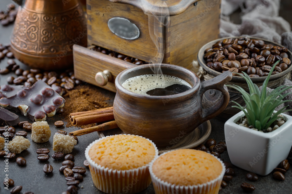 Black coffee on an old background in a cup Black coffee on an old background in a cup