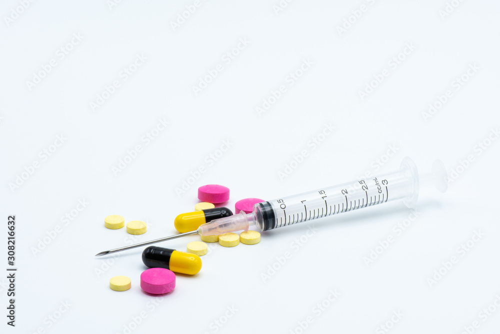 Pill and syringe Pill and syringe