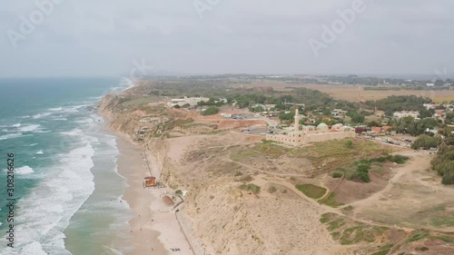 A mosque on the Apollonia sea shore in Israel, 4k aerial drone view photo