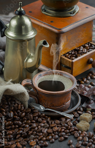 Black coffee on an old background in a cup