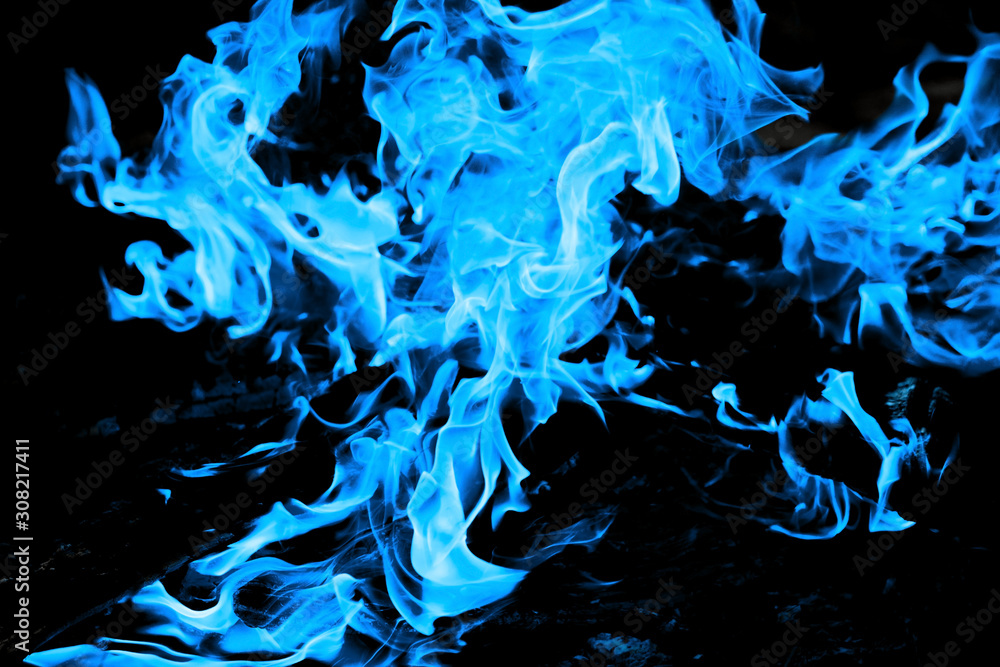burning blue fire on a black background