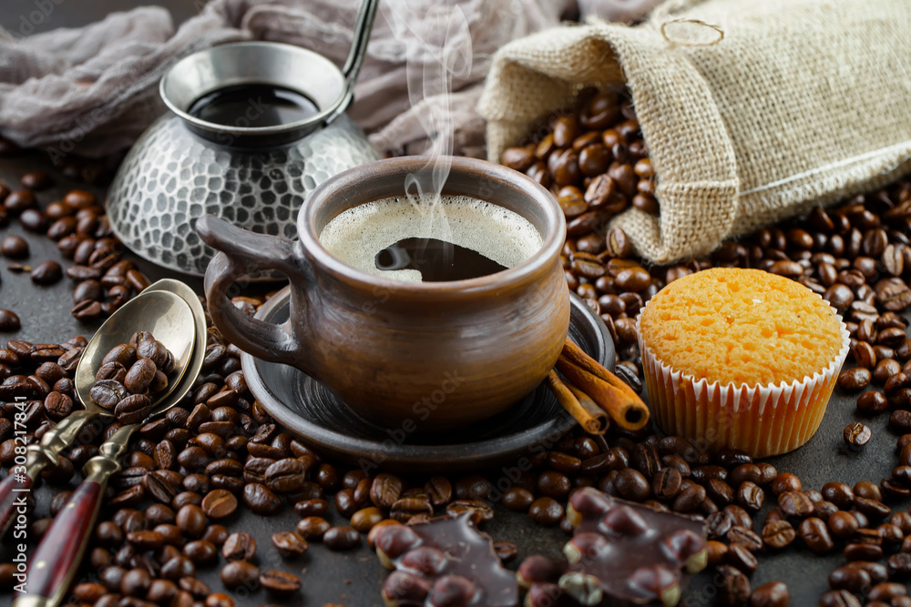 Black coffee beans roast in a pan in the smoke Black coffee beans roast in a pan in the smoke