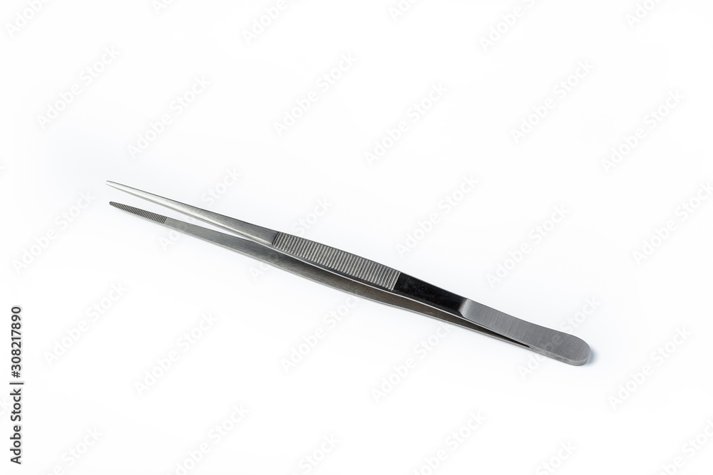 Stainless steel tweezers on white background Stainless steel tweezers on white background