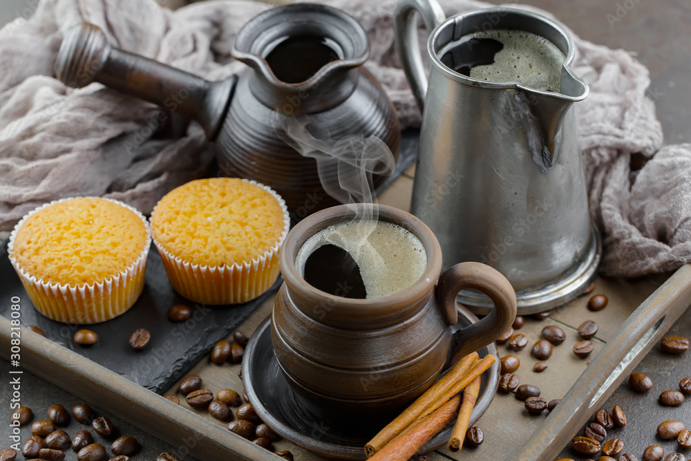 Black coffee beans on an old backgroundм Black coffee beans on an old backgroundм