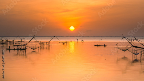 Sunrise with fishing trap in Pak Pra Talay Noi sea Phatthalung south of Thailand