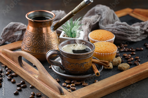 Black coffee on an old background in a cup