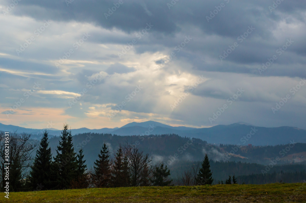 Autumn landscape background in the rain weather with fog