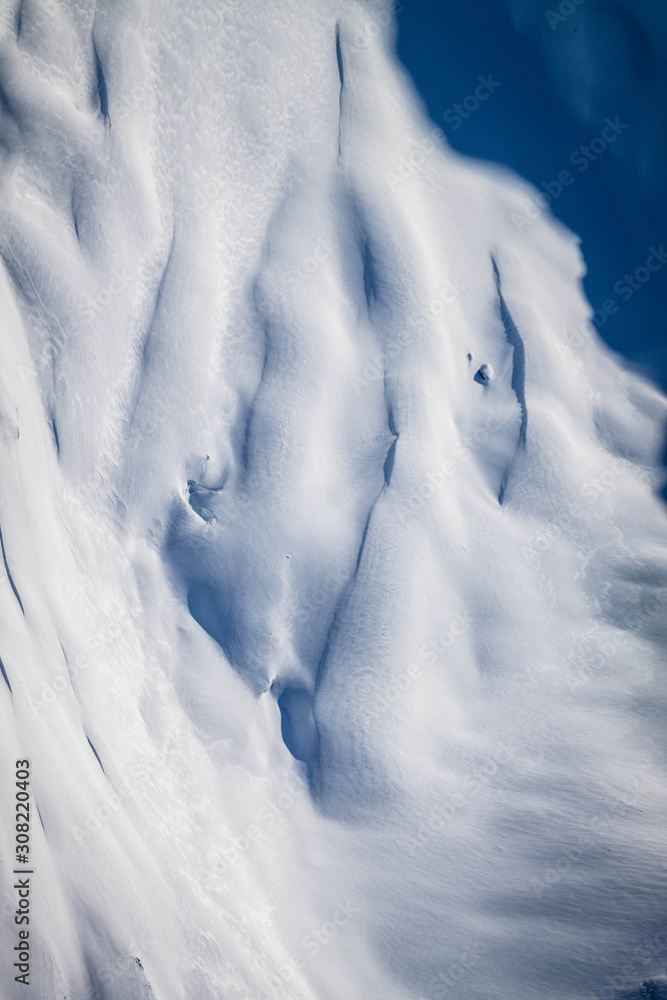Obraz premium Beautiful winter panorama with fresh powder snow. in tall mighty mountains Elbrus, ski resort, the Republic of Kabardino-Balkaria, Russia