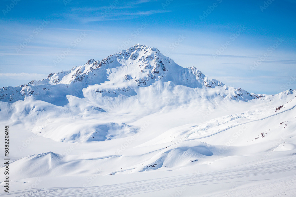 Winter panoramic view of the snowy high mountains of Elbrus in the Russia