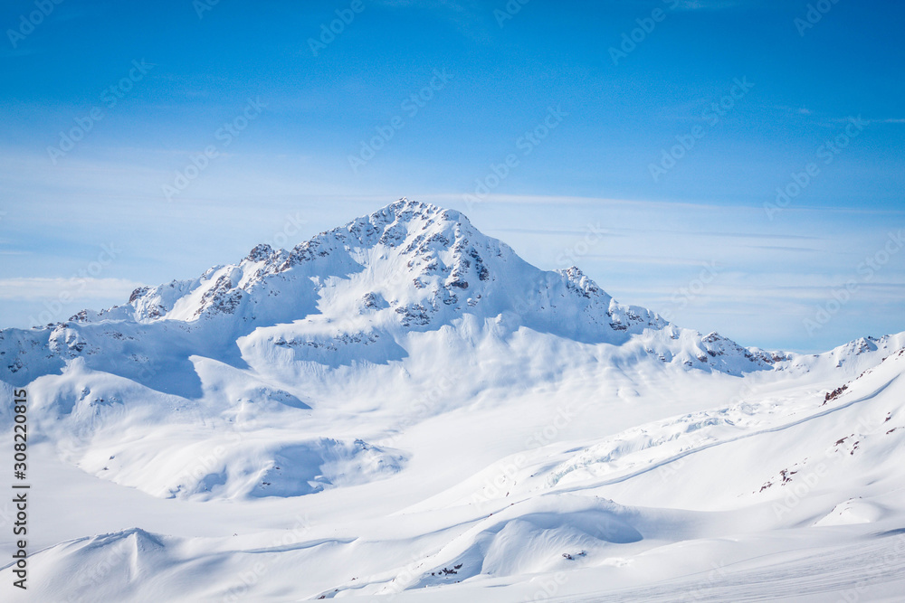 Winter panoramic view of the snowy high mountains of Elbrus in the Russia Winter panoramic view of the snowy high mountains of Elbrus in the Russia