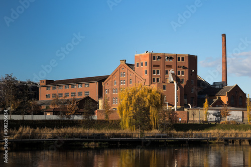 beautiful building on a sunny day next to the river