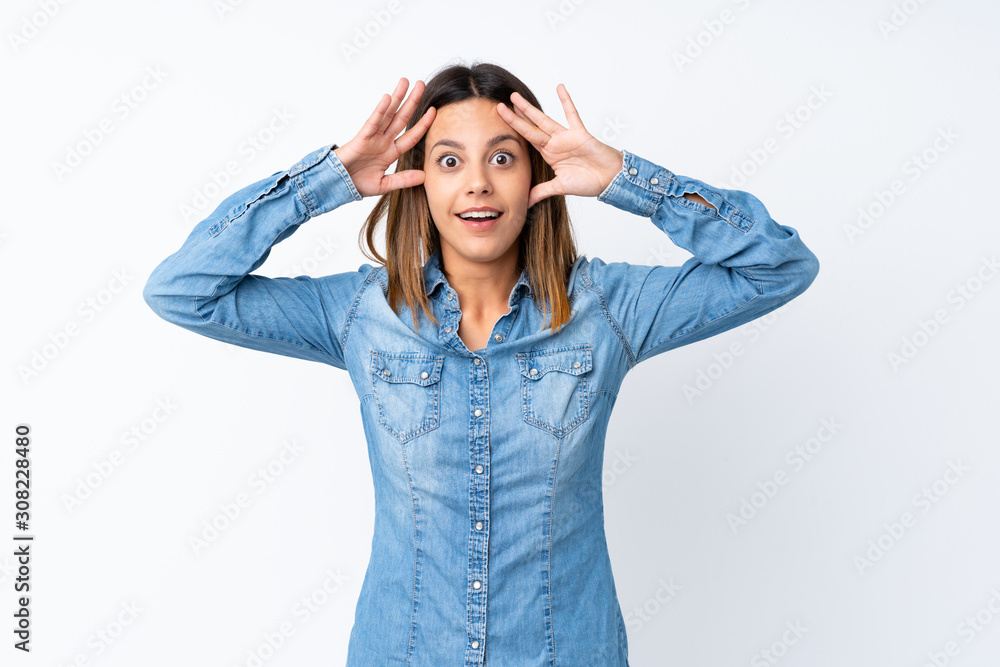 Young woman over isolated white background with surprise expression Young woman over isolated white background with surprise expression