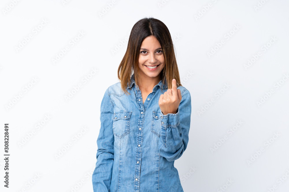 Young woman over isolated white background inviting to come with hand. Happy that you came Young woman over isolated white background inviting to come with hand. Happy that you came