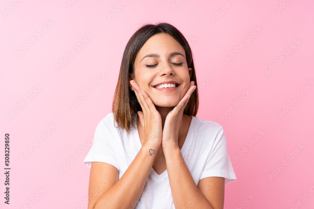 Young woman over isolated pink background Young woman over isolated pink background