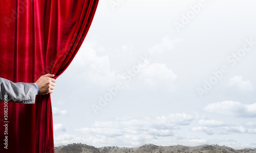 Summer natural bluesky view behind red velvet curtain