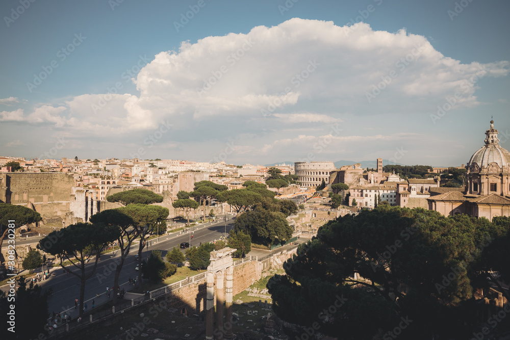 Fototapeta premium Panoramic view of city Rome with Roman forum and Colosseum from Vittoriano