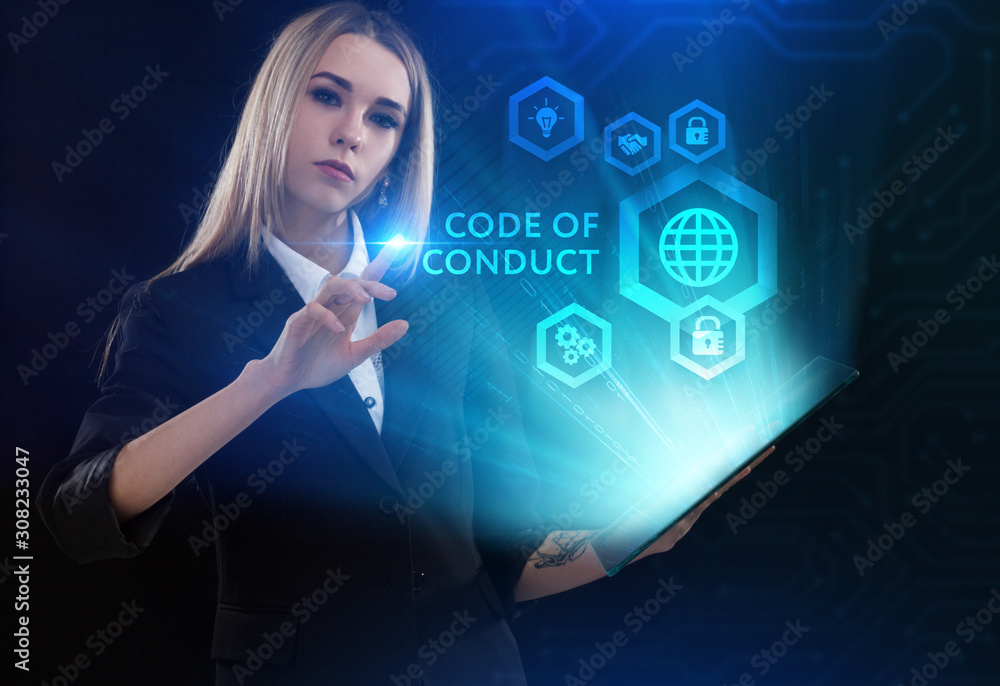 Business, Technology, Internet and network concept. Young businessman working on a virtual screen of the future and sees the inscription: Code of conduct Business, Technology, Internet and network concept. Young businessman working on a virtual screen of the future and sees the inscription: Code of conduct