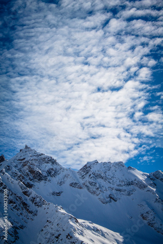 Magnificent view of the snow-white tall mighty mountains Elbrus, ski resort, the Republic of Kabardino-Balkaria, Russia