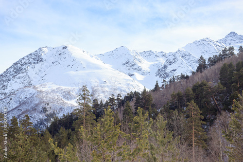 Winter snow forest landscape on mountain Elbrus, ski resort, the Republic of Kabardino-Balkaria, Russia. © dolphinartin