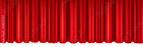 Red curtains of theater stage.