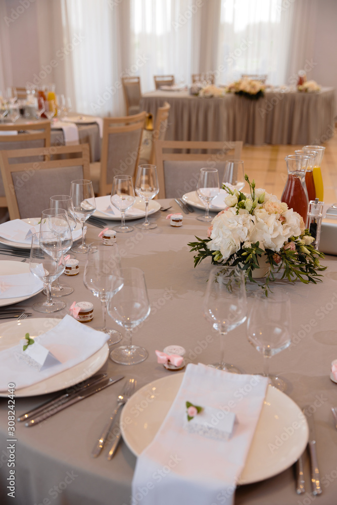 Food served on table in a white hall during a wedding reception in Eastern European Baltic Riga Latvia - Biege, creme and pink colors with name signs on dishes - Canape, snacks and light drinks Food served on table in a white hall during a wedding reception in Eastern European Baltic Riga Latvia - Biege, creme and pink colors with name signs on dishes - Canape, snacks and light drinks