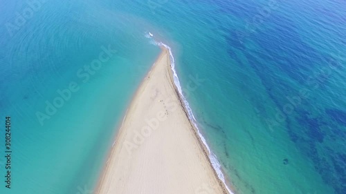 Akra Epanomi - The end of the sand beach and turquoise sea on the both sides of the beach  photo