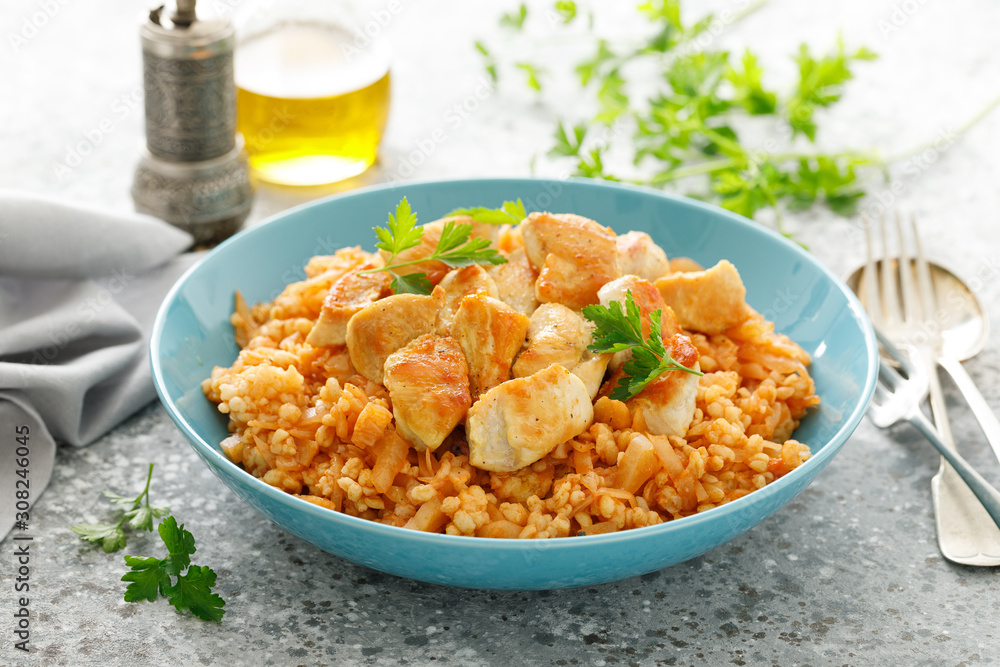 Fried cabbage, bulgur and chicken breast
