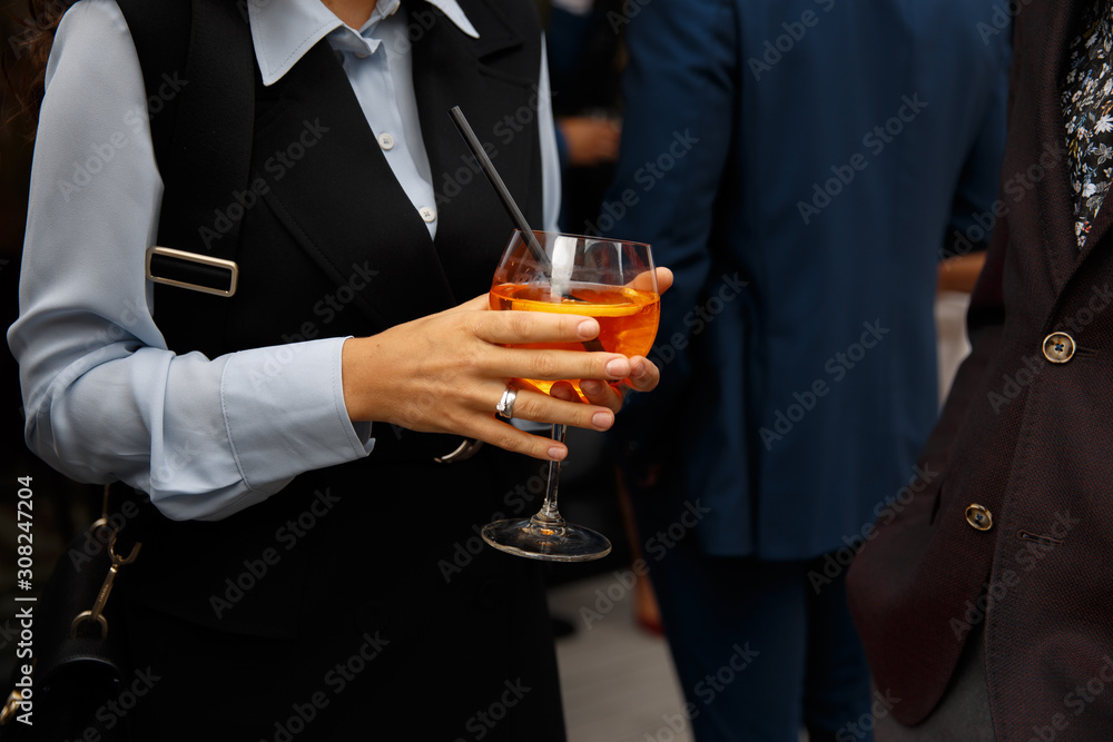 Business party conference in Eastern European Baltic Riga Latvia - Cocktail drinks close up and people chatting Business party conference in Eastern European Baltic Riga Latvia - Cocktail drinks close up and people chatting