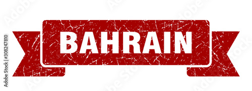 Bahrain ribbon. Red Bahrain grunge band sign