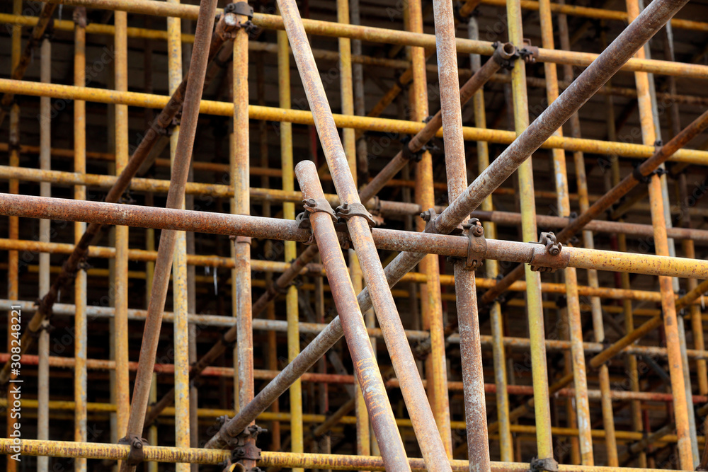 Scaffolding steel pipe at a construction site Scaffolding steel pipe at a construction site