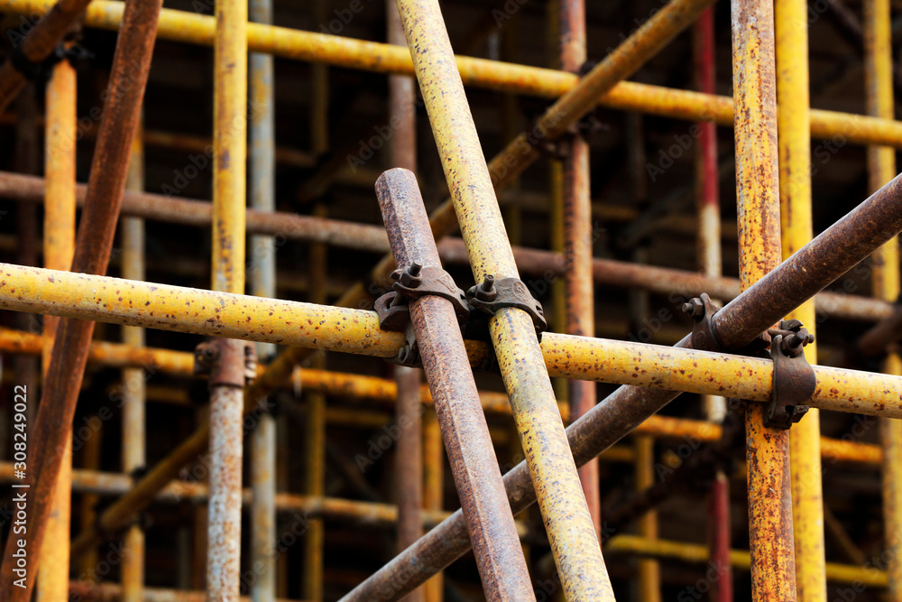 Scaffolding steel pipe at a construction site Scaffolding steel pipe at a construction site