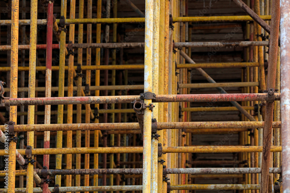 Scaffolding steel pipe at a construction site Scaffolding steel pipe at a construction site