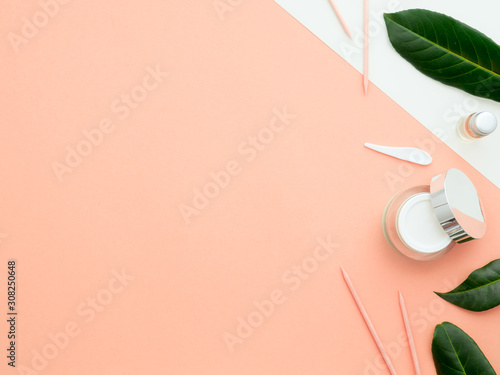 Billede på lærred green leaves, hand or face cream and nail cuticle sticks