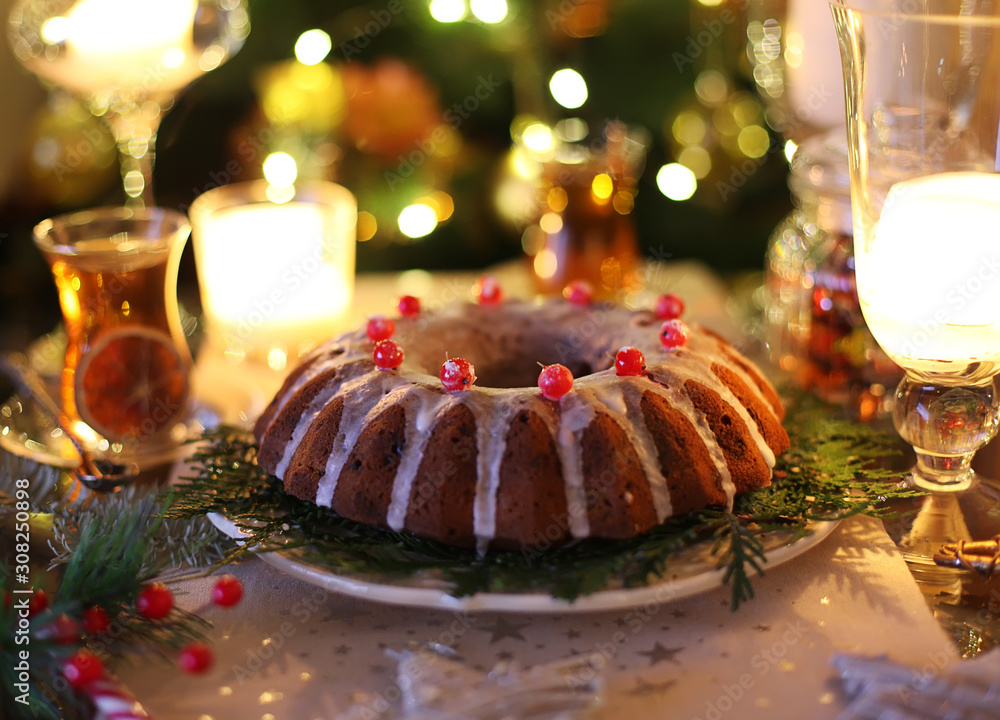 Traditional Christmas cake with dried fruits, raisins and nuts with Christmas decoration Traditional Christmas cake with dried fruits, raisins and nuts with Christmas decoration