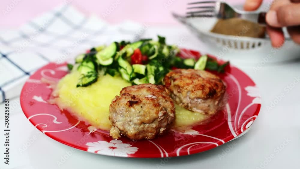Meat cutlet with mashed potatoes and cucumbers Meat cutlet with mashed potatoes and cucumbers