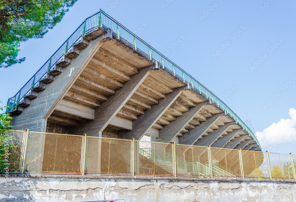 Concrete and metal stadium exterior stand built structure of Melani stadium in Pistoia, Tuscany, Italy Concrete and metal stadium exterior stand built structure of Melani stadium in Pistoia, Tuscany, Italy