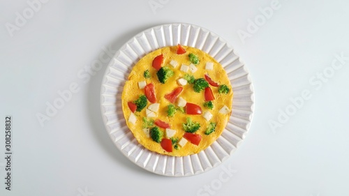 Omelet with broccoli, cheese and tomatoes