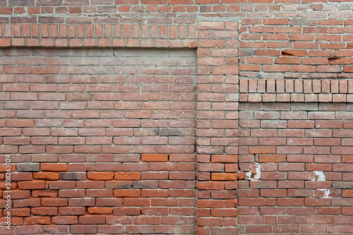 Old brick wall with decorations - Brick texture