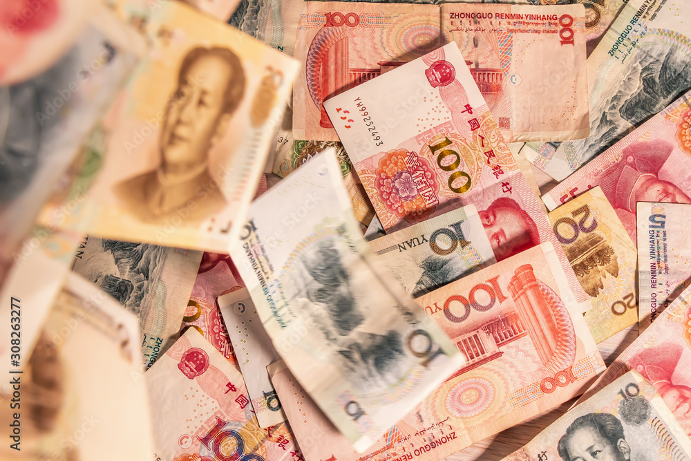 Obraz premium Chinese Renminbi RMB. People's Currency. Yuan CNY banknotes
