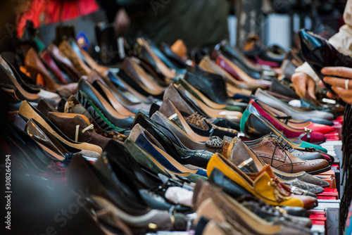 Different shoes in a market in Milan