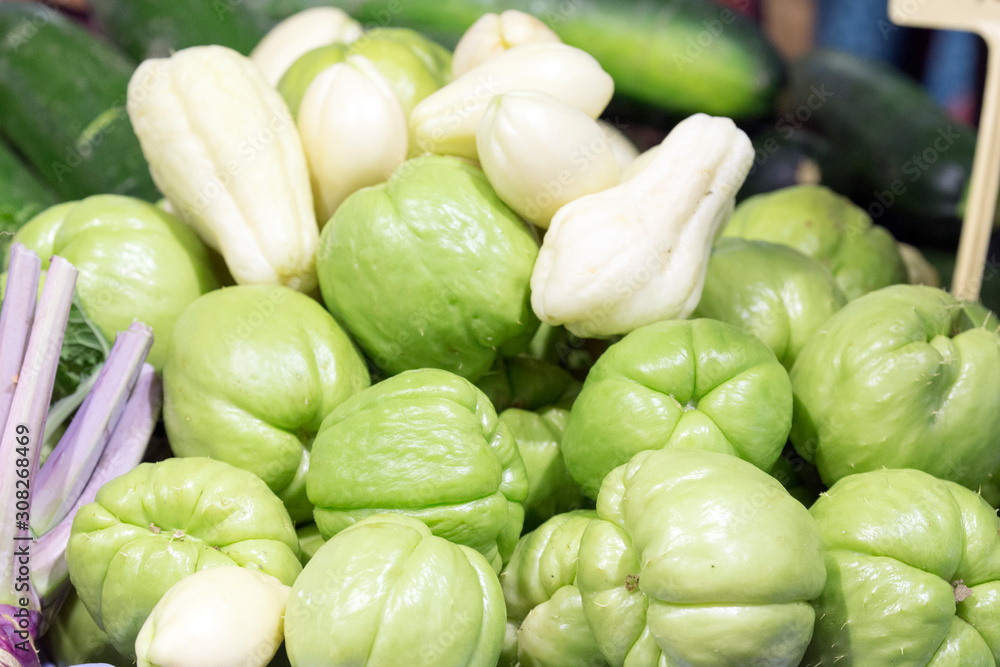 chayote, also known as mirliton squash at market chayote, also known as mirliton squash at market