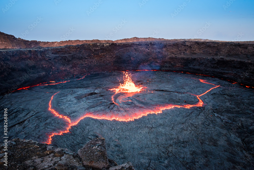 Ripple of lava and sparkling lava at Erta Ale volcano - obrazy, fototapety, plakaty 