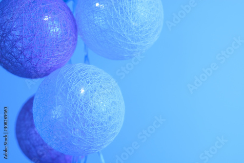 Garland from balls toned in blue color