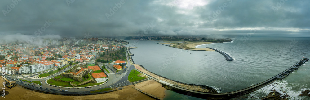 Aerial view of Duero de Foz at the mouth of the Duero river as it flows into the Atlantic ocean with Forte de Sao Joao Baptista guarding the entrance to Porto
