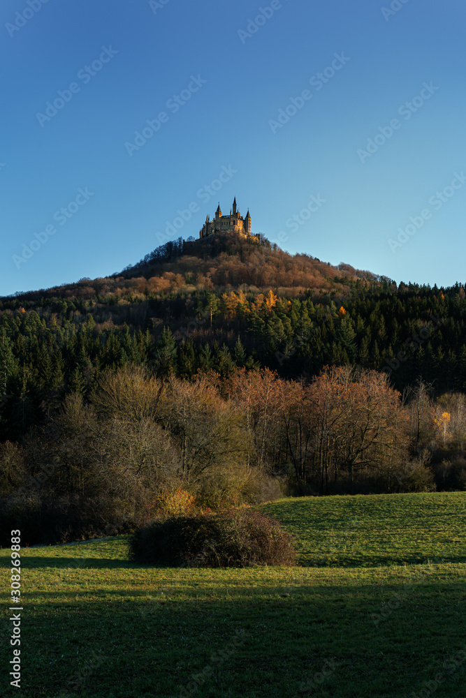 Castle Hohenzollern on a mountain in Germany during sunset at golden hour